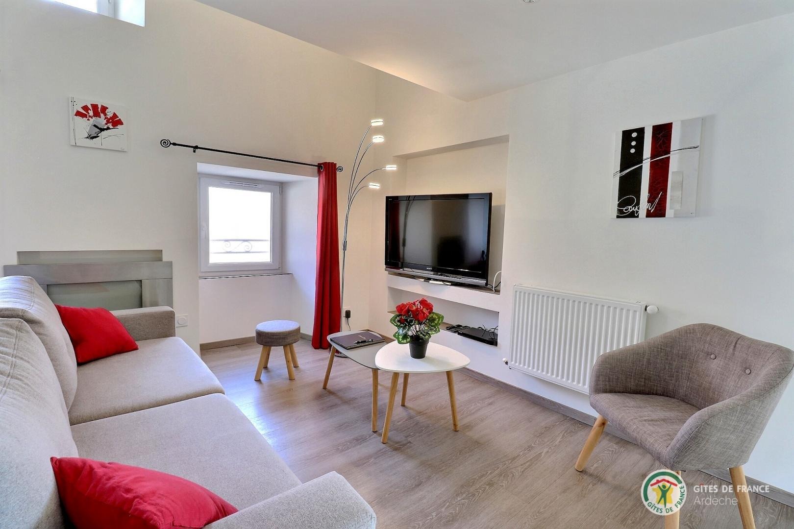 Salon avec écran plat