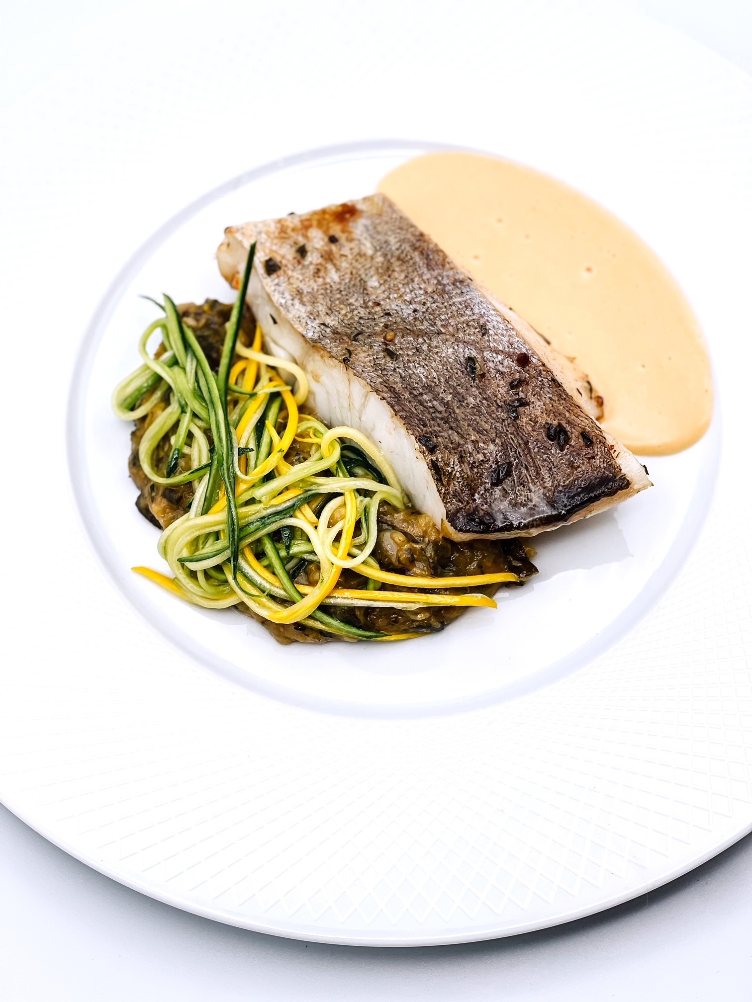 Mets Délices Traiteur - Dos de lieu jaune nacré, déclinaison de courgette à la Marjolaine