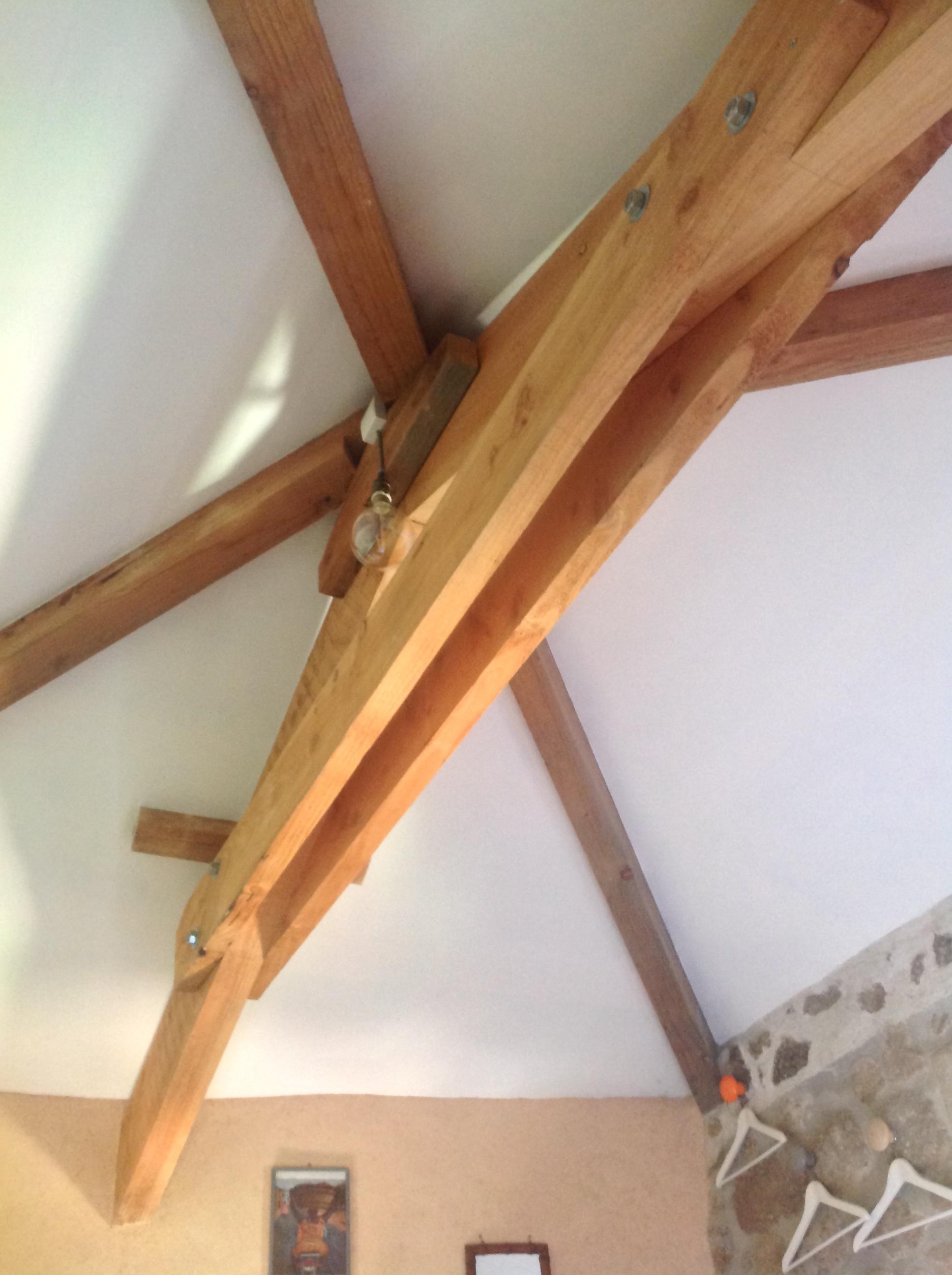 Charpente au dessus du lit